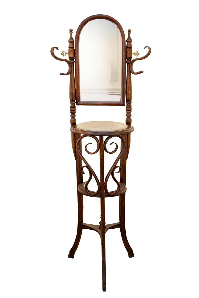 Classic mirror supported on wall